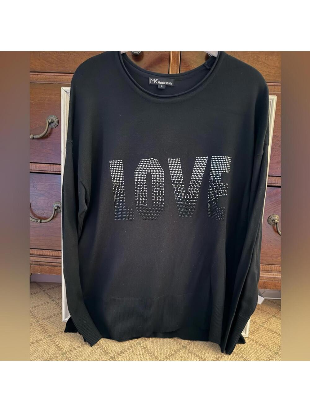 Metric Knits black crew neck long sleeved sweater with studded details L